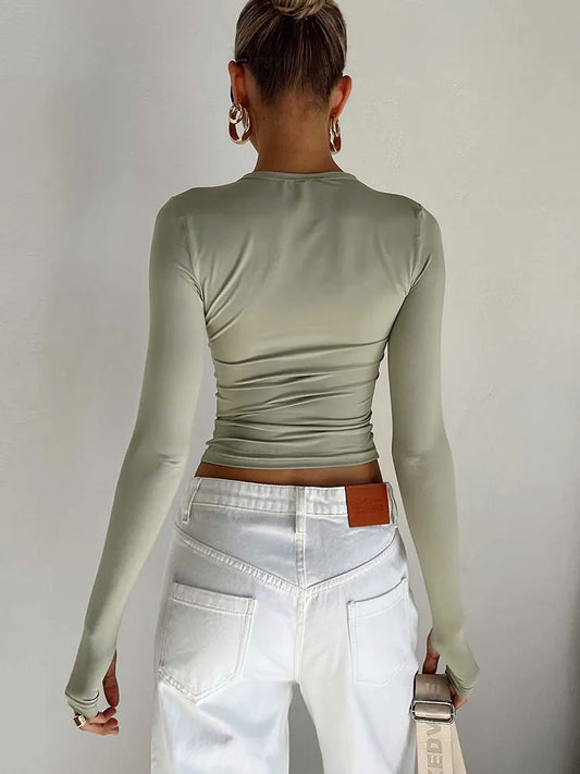 Camiseta Feminina Cropped Slim Fit – Blusa de Manga Longa com Gola Redonda, Abertura para Polegar e Estilo Streetwear Casual para o Dia a Dia