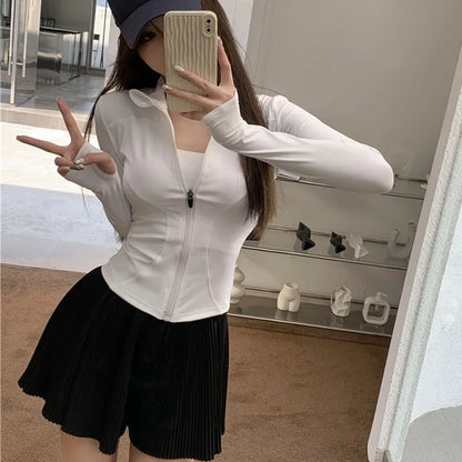 Camiseta Feminina 2026 Slim Fit – Blusa de Manga Longa com Zíper, Modelagem Ajustada, Proteção UV e Estilo Fitness para Yoga