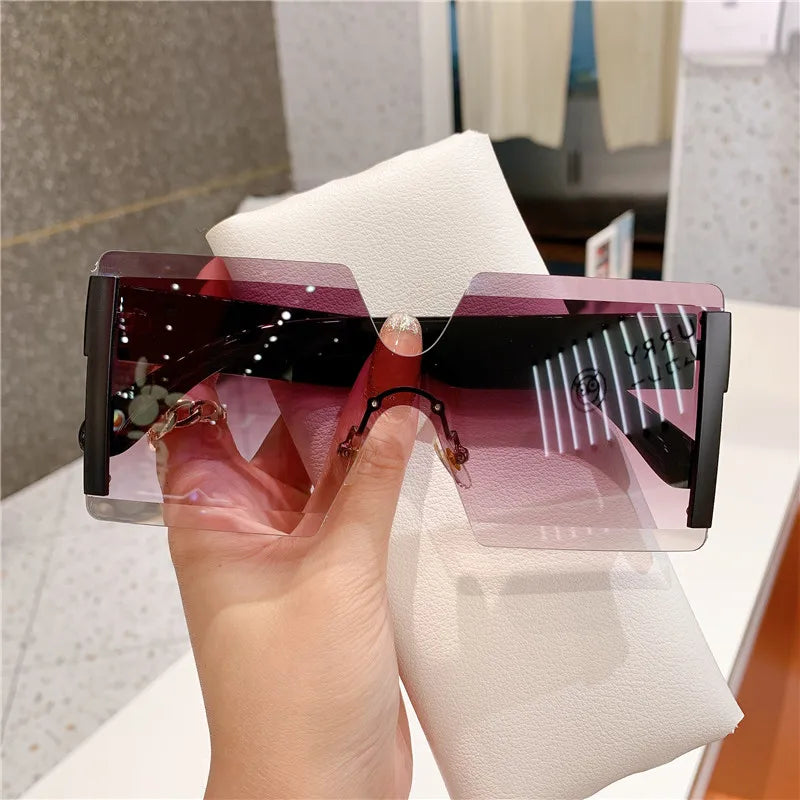 Óculos de Sol Feminino Oversized Sem Armação – Modelo Fashion Retrô com Lentes Degradê e Proteção UV