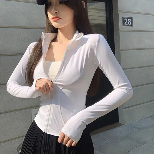 Camiseta Feminina 2026 Slim Fit – Blusa de Manga Longa com Zíper, Modelagem Ajustada, Proteção UV e Estilo Fitness para Yoga